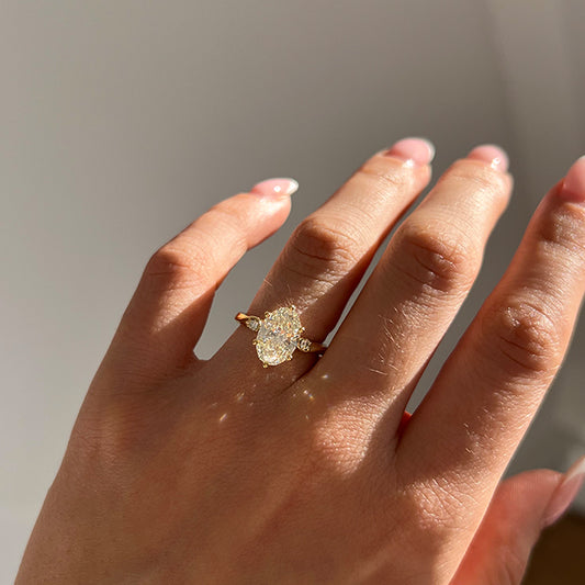 2.06 Carat Lab Grown Oval Diamond Trilogy Alani Engagement Ring in 14K Yellow Gold