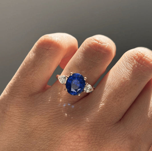 5.90 Carat Natural Oval Sapphire Blue Trilogy Nimi Engagement Ring in 14K Yellow Gold