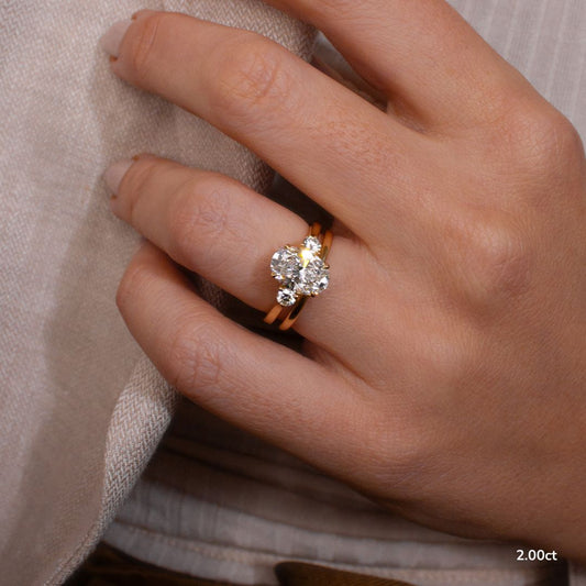 2.10 Carat Lab Grown Oval Diamond Trilogy Engagement Ring in 14K Yellow Gold