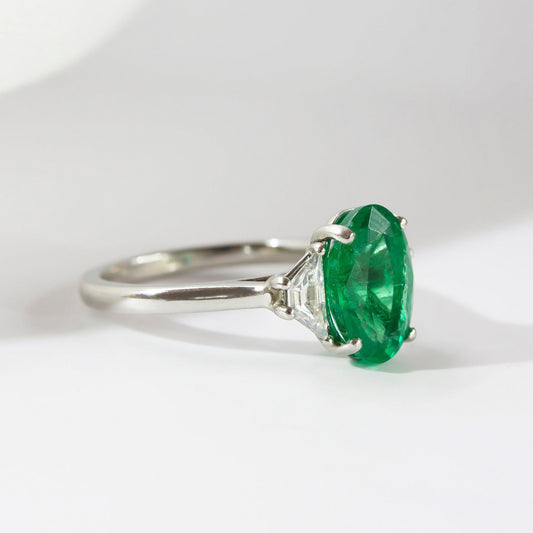2.60 Carat Lab Grown Oval Emerald Trapezoid Trilogy Engagement Ring in Platinum