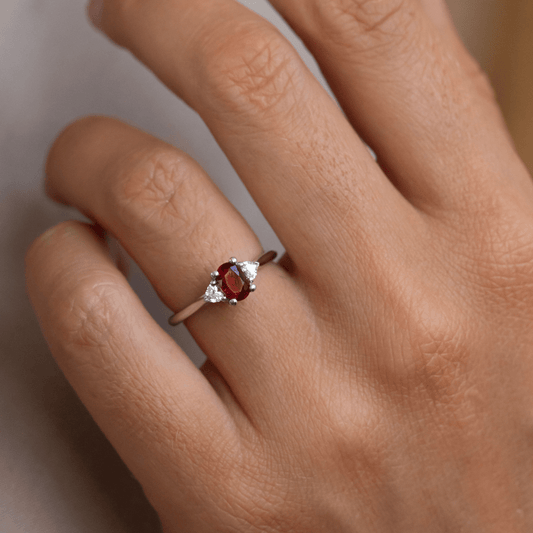 0.85 Carat Lab Grown Oval Ruby Trilogy Venus Engagement Ring in Platinum