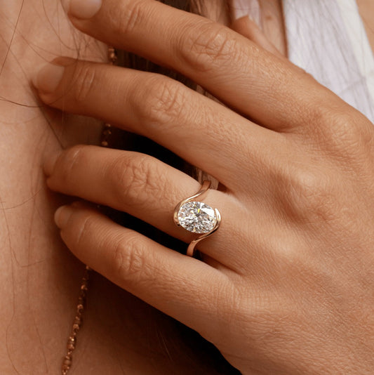 4.00 Carat Lab Grown Oval Diamond Bezel Sculptural Solenne Engagement Ring in 14K Yellow Gold