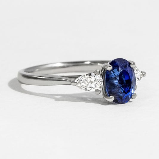 2.08 Carat Lab Grown Oval Sapphire Blue Trilogy Engagement Ring in Platinum