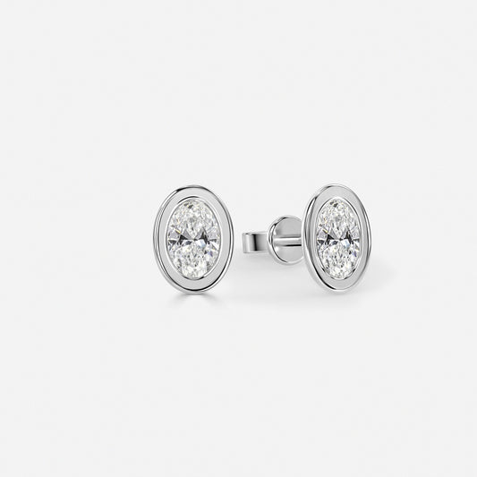 0.50 Carat Lab Grown Oval Diamond Bezel Set Earrings in Platinum