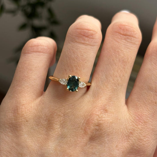 1.42 Carat Natural Oval Sapphire Natural Teal Trilogy Amaya Engagement Ring in 14K Yellow Gold