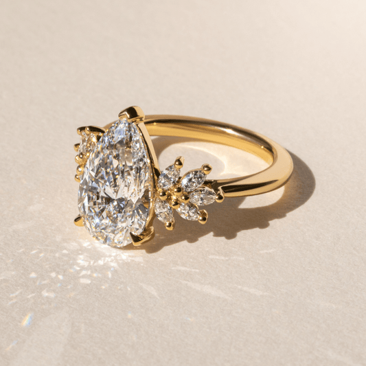 4.30 Carat Lab Grown Pear Diamond Anastasia Trilogy Engagement Ring in 14K Yellow Gold