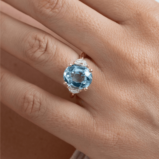 6.13 Carat Lab Grown Oval Gemstone Aquamarine Trilogy Moonlight Engagement Ring in 14K Yellow Gold