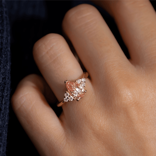 1.40 Carat Lab Grown Pear Diamond Pink Trilogy Isabella Engagement Ring in 14K Yellow Gold