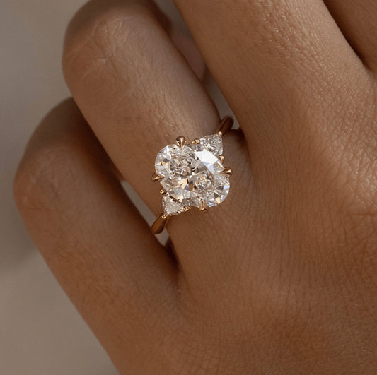 3.30 Carat Lab Grown Oval Diamond Trilogy Manilla Engagement Ring in 14K Yellow Gold